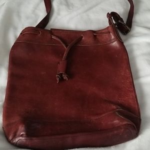 Crossbody distressed leather bag